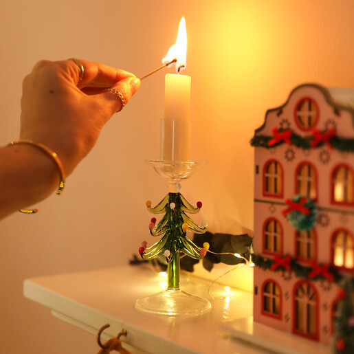 candle stick with lit candle