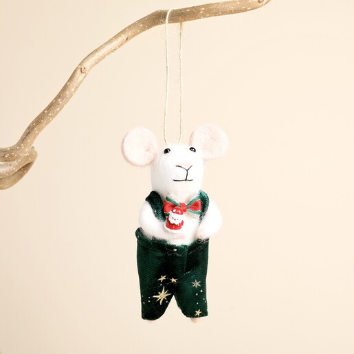 Felt mouse Christmas decoration hanging from a wooden branch against a neutral background