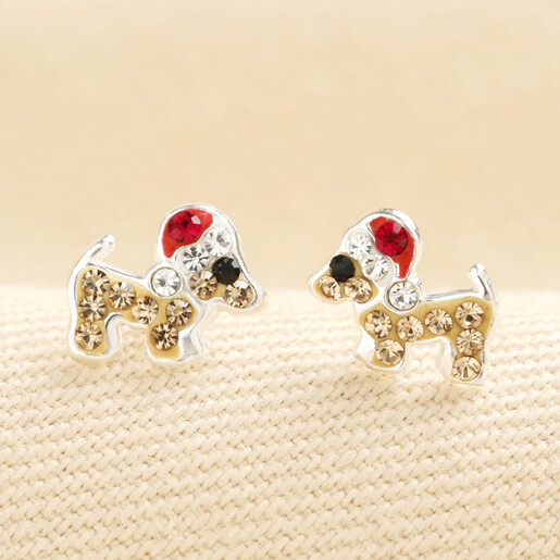 A pair of sterling silver sausage dog stud earrings with crystal Santa hats
