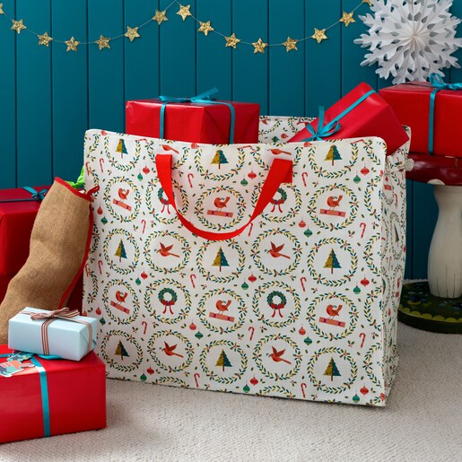 Rex Christmas jumbo storage bag filled with wrapped Christmas presents