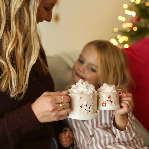 mother daughter shot of festive mug