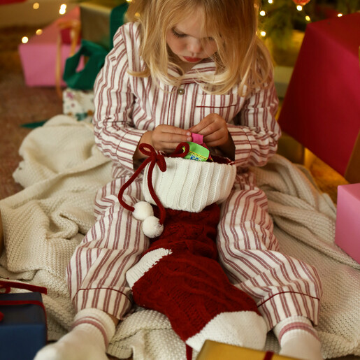 model shot of red and white christmas stocking