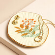 Leaf Organic Trinket Dish with jewellery inside against beige coloured backdrop