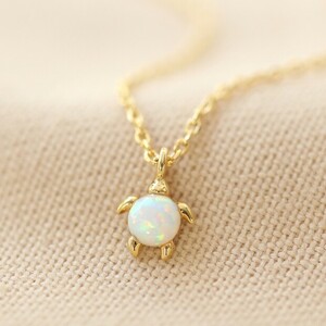 Opal Turtle necklace in Gold